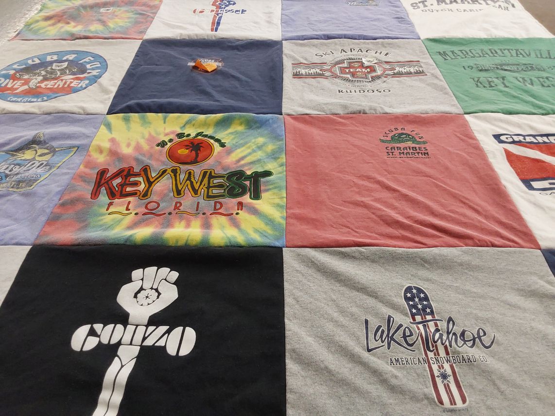 T-shirt quilt with diving, skiing themes by Stephanie from TX
