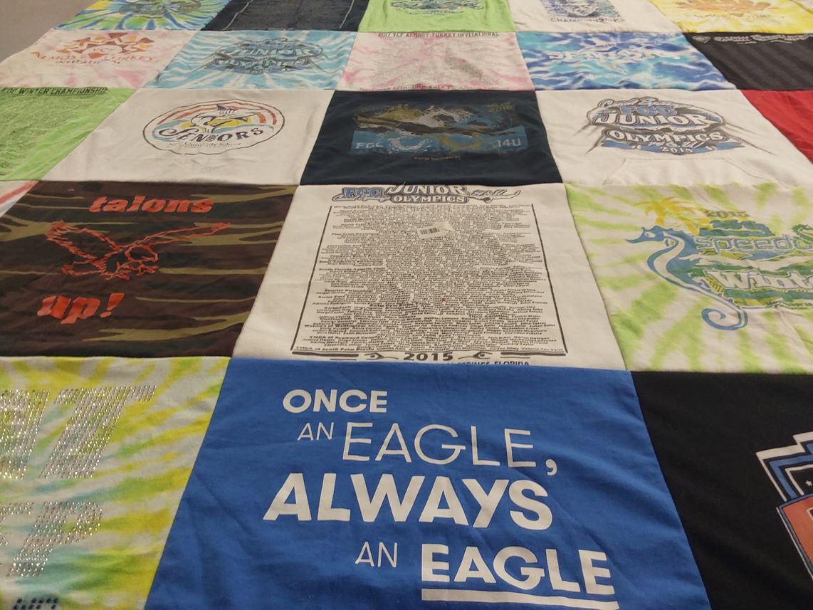 T-shirt quilt with junior olympics, sports themes by Elizabeth from CA