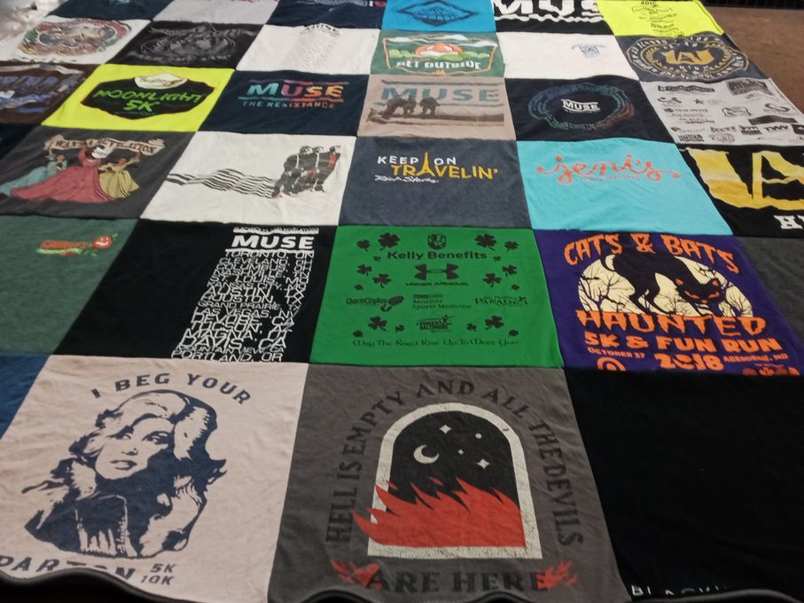 T-shirt quilt with running, music themes by Megan from MD