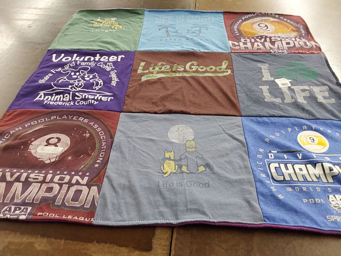 T-shirt quilt with volunteering, animal care themes by Patricia from MD