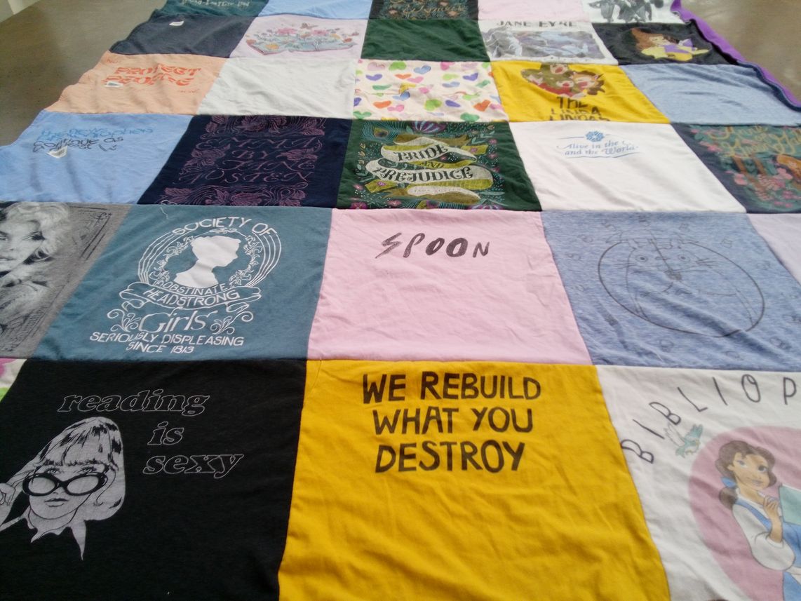 T-shirt quilt with reading, literature themes by Miranda from VA