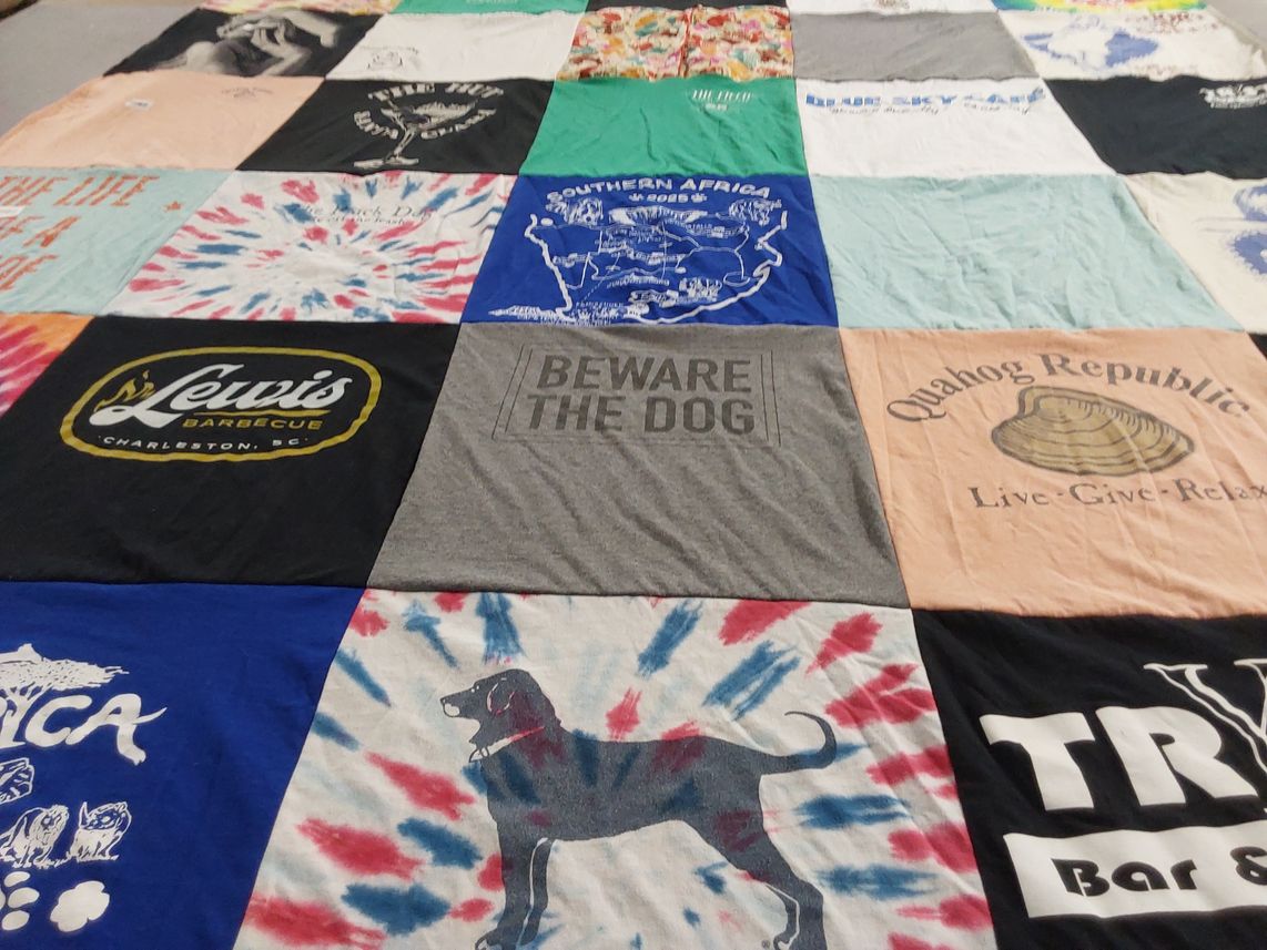 T-shirt quilt with food, pets themes by Kathryn from CA