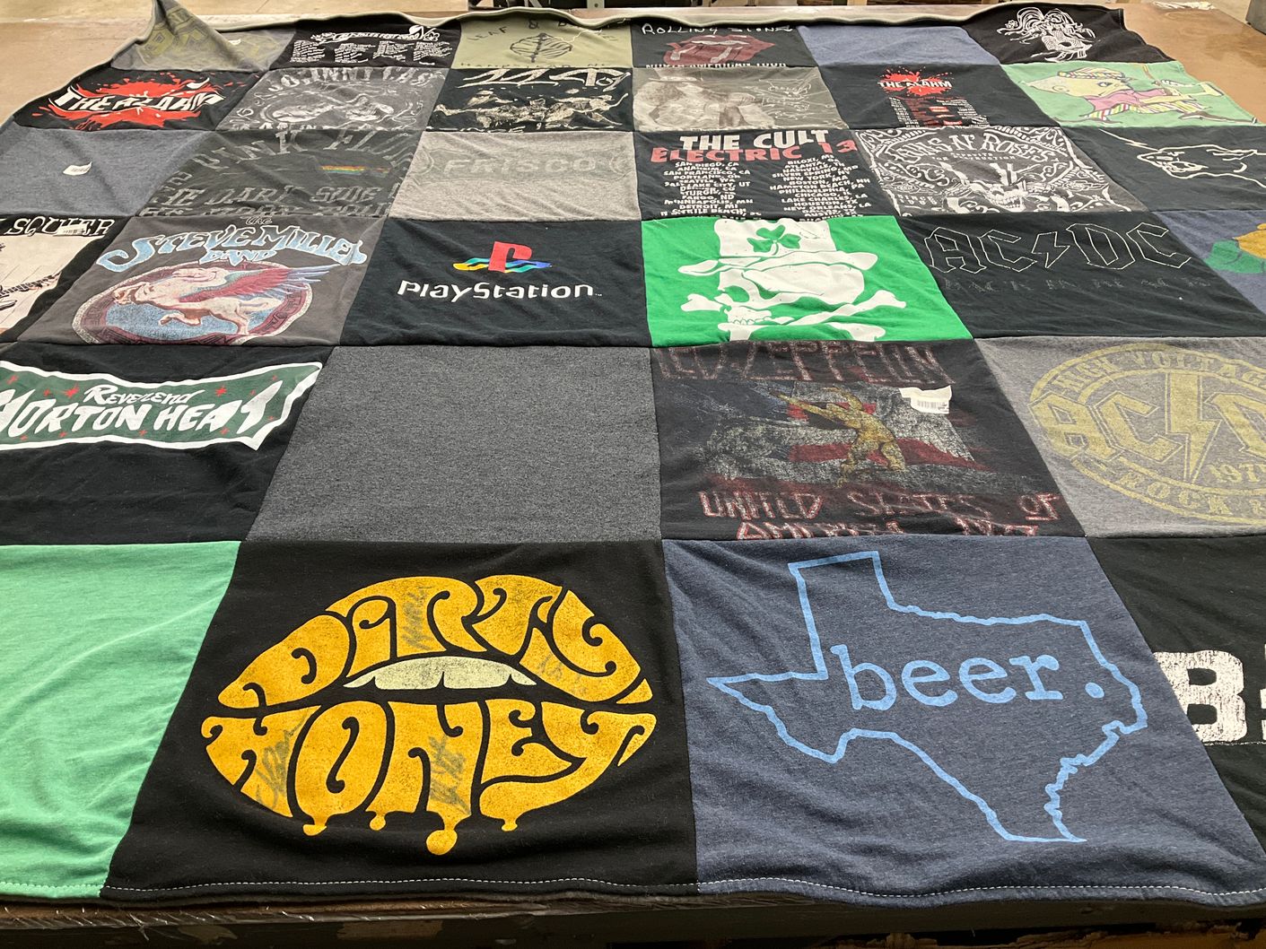 T-shirt quilt with music, gaming themes by Richard from NC