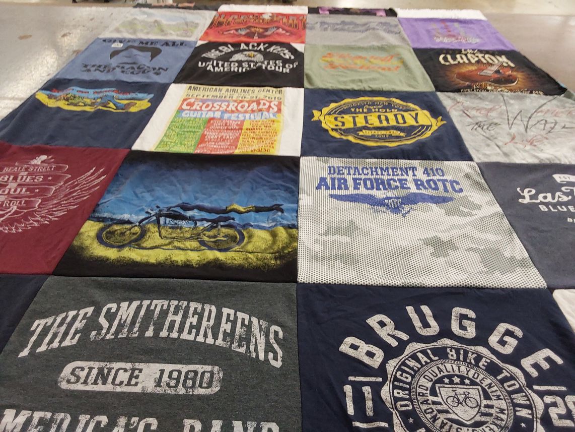 T-shirt quilt with music, biking themes by Richard from NM