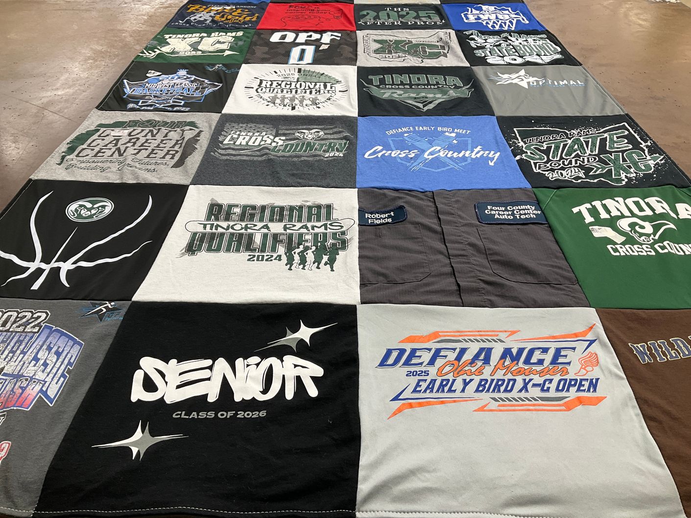 T-shirt quilt featuring tinora cross country team by Bob from OH