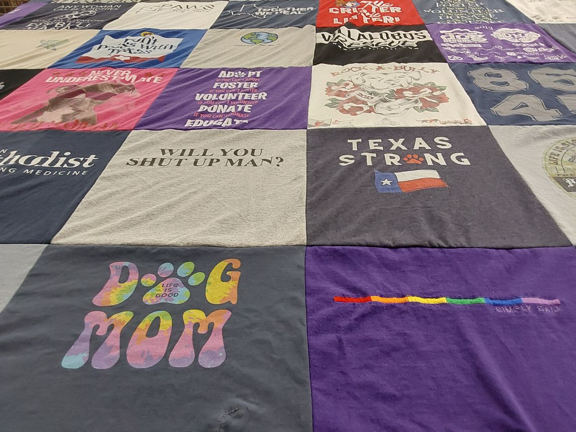 T-shirt quilt with volunteering, dogs themes by Anna from TX