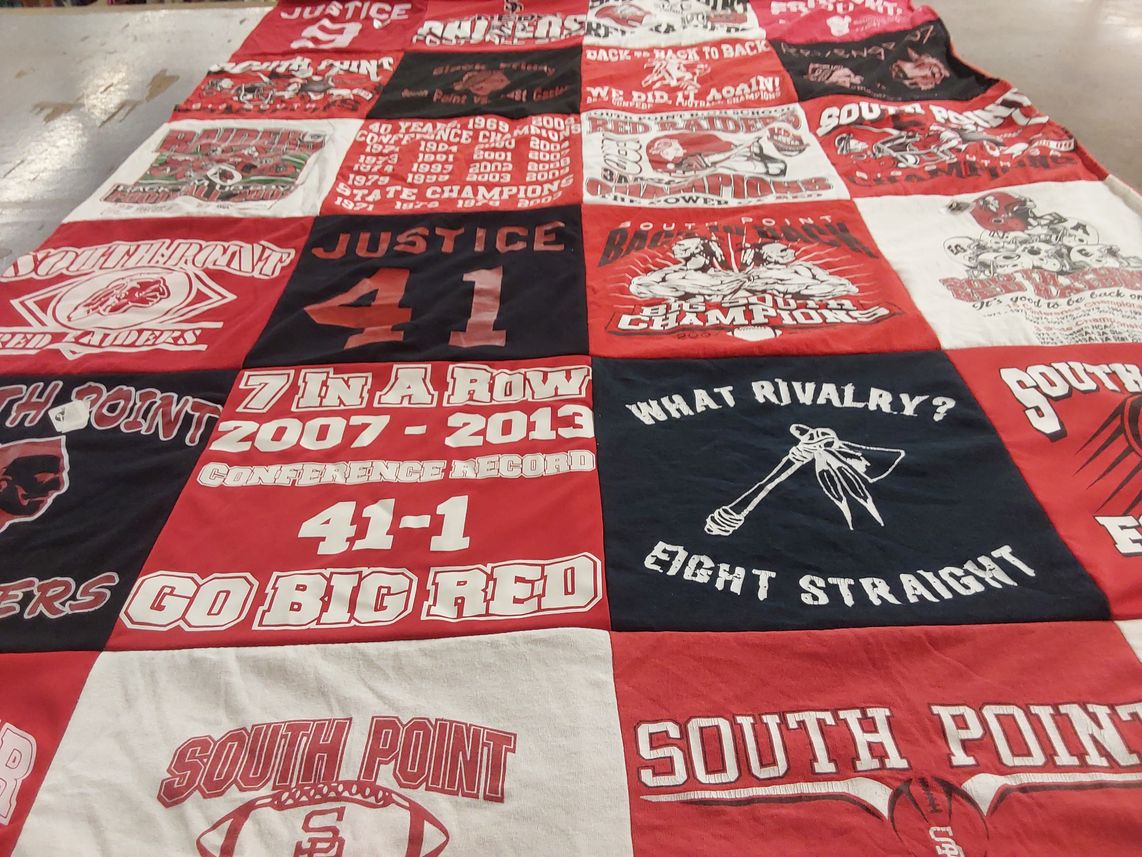 T-shirt quilt featuring south point red riders by Frank from NC