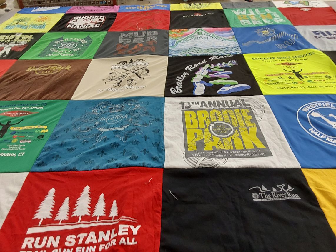 T-shirt quilt with running, community events themes by KIMBERLY from CT
