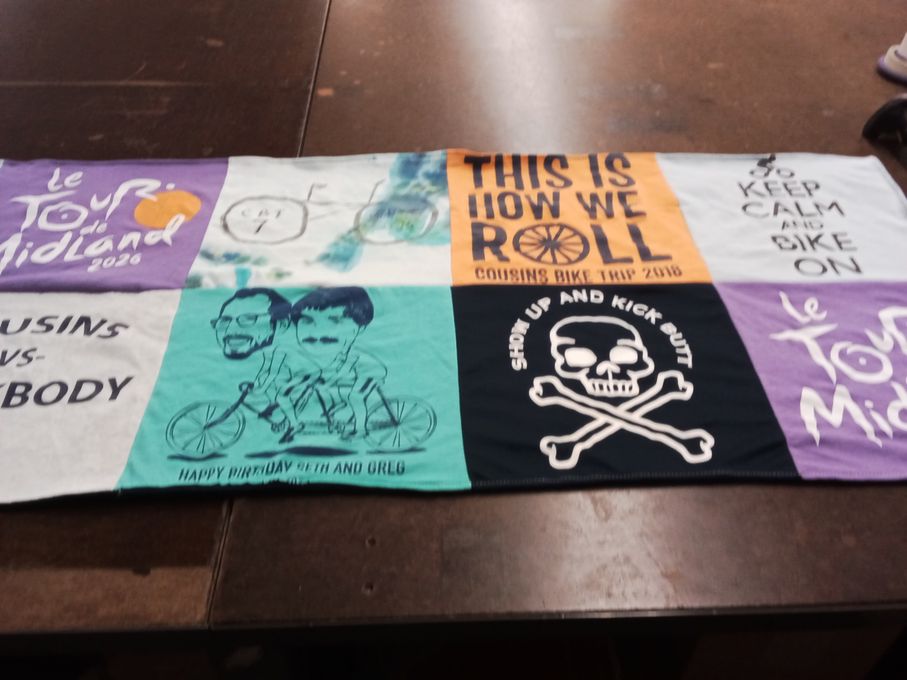 T-shirt quilt with cycling, birthdays themes by Laurie from MI