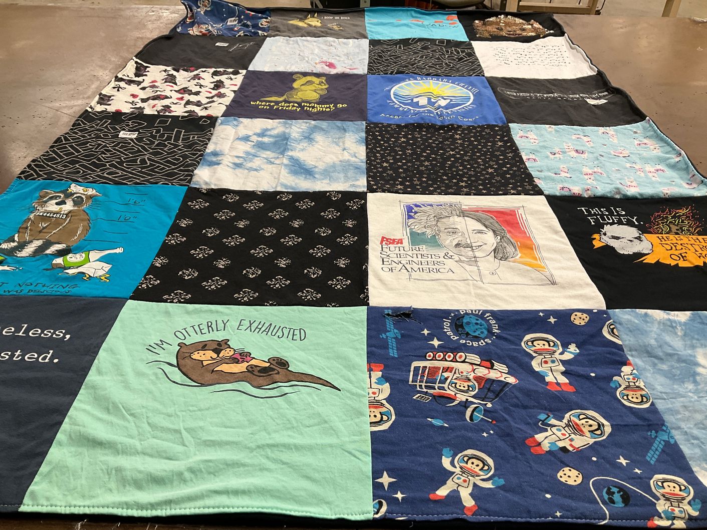 T-shirt quilt with science, space themes by Crosby from CA