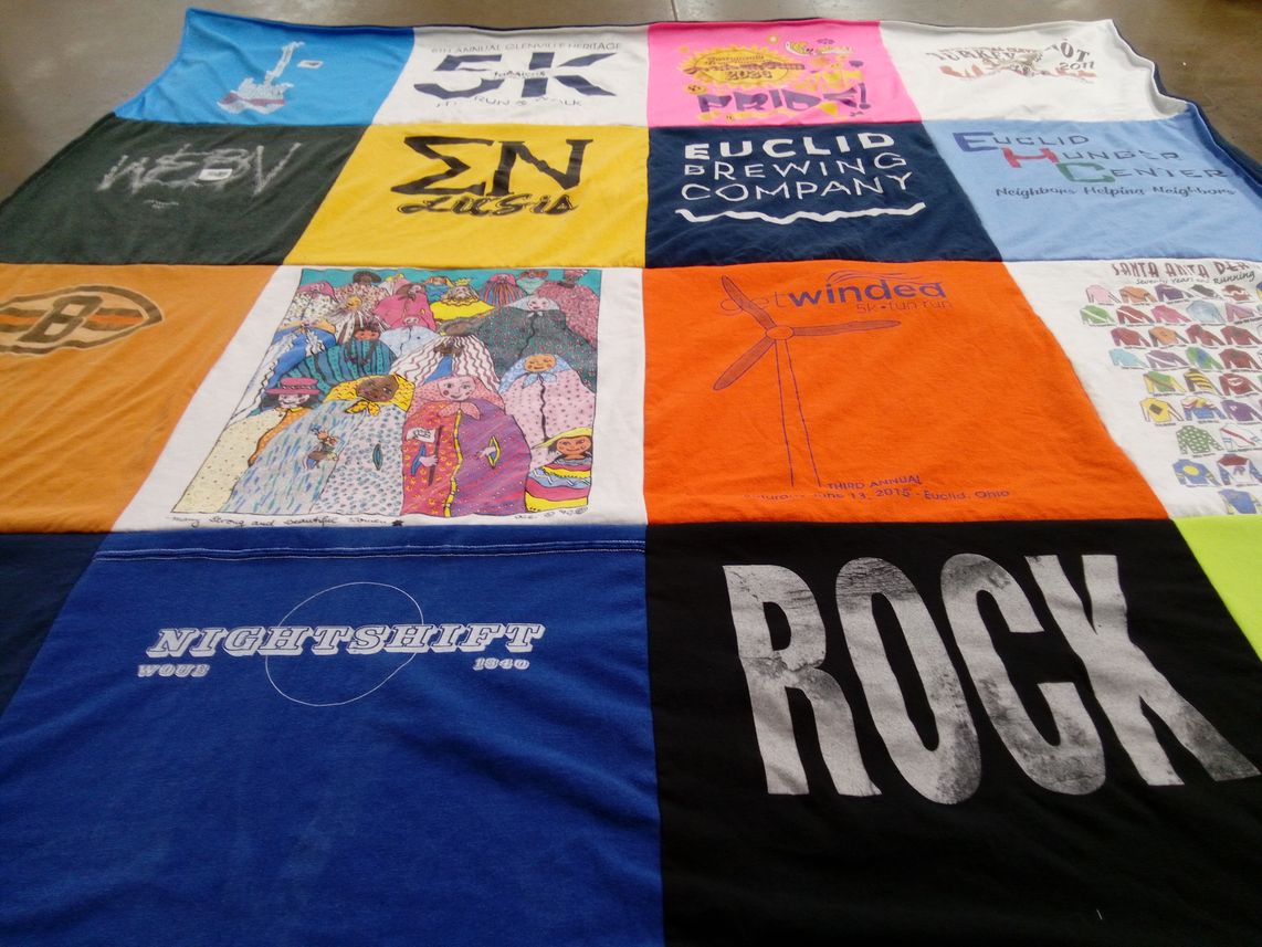 T-shirt quilt with cultural diversity, community service themes by Kimberly from CA