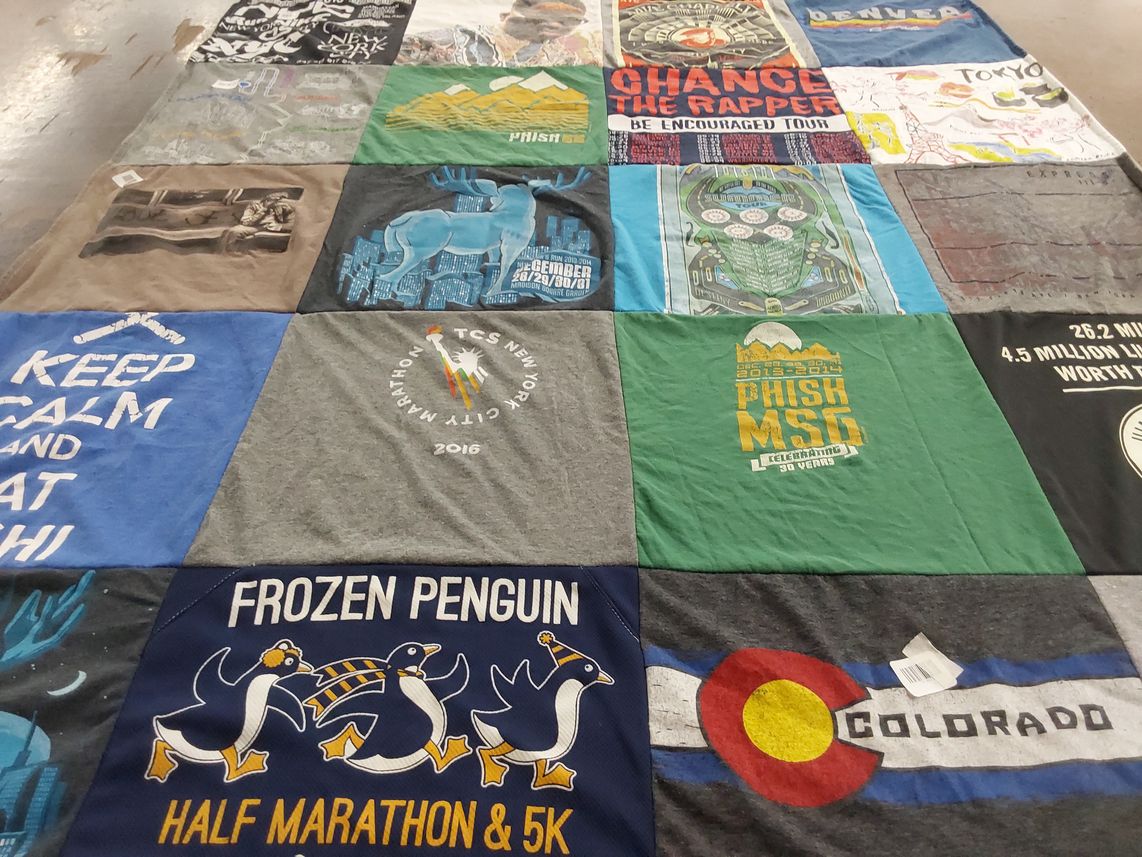 T-shirt quilt with music, running themes by Sara from IL