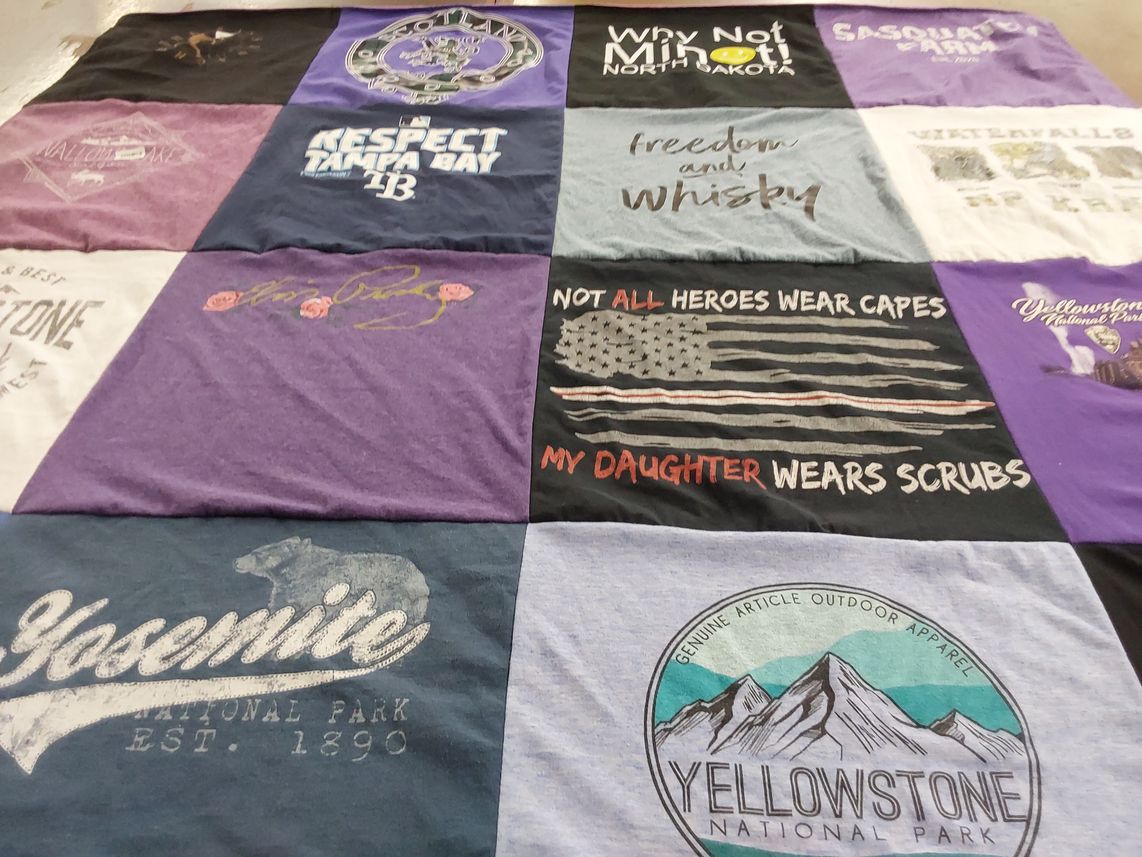 T-shirt quilt with national parks, outdoor activities themes by Joanna from FL