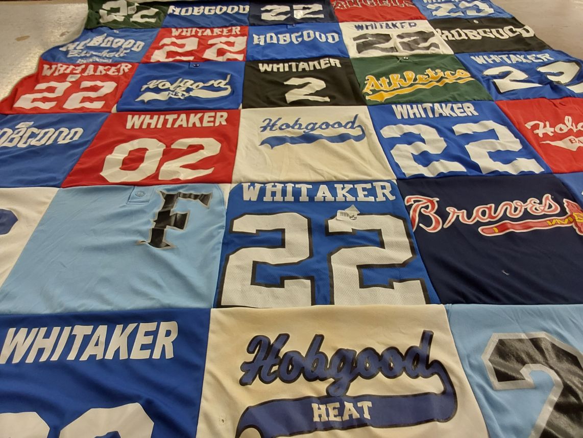 T-shirt quilt with sports themes by Dana from GA