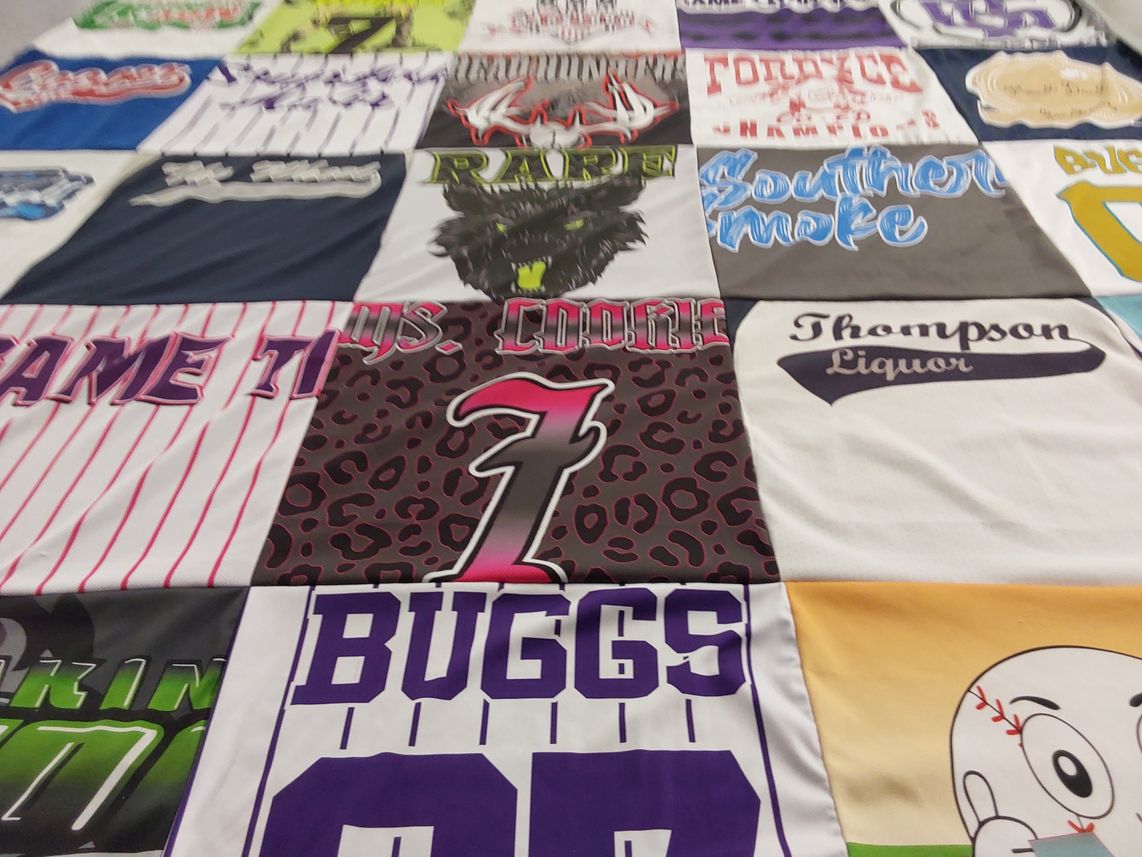 T-shirt quilt with sports, liquor themes by Gloria from AR