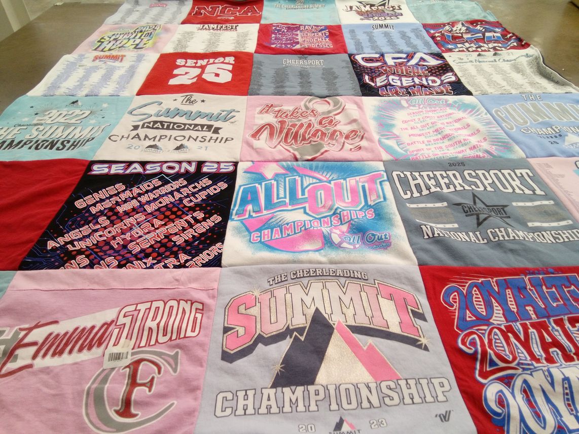 T-shirt quilt with cheerleading themes by Heather from FL