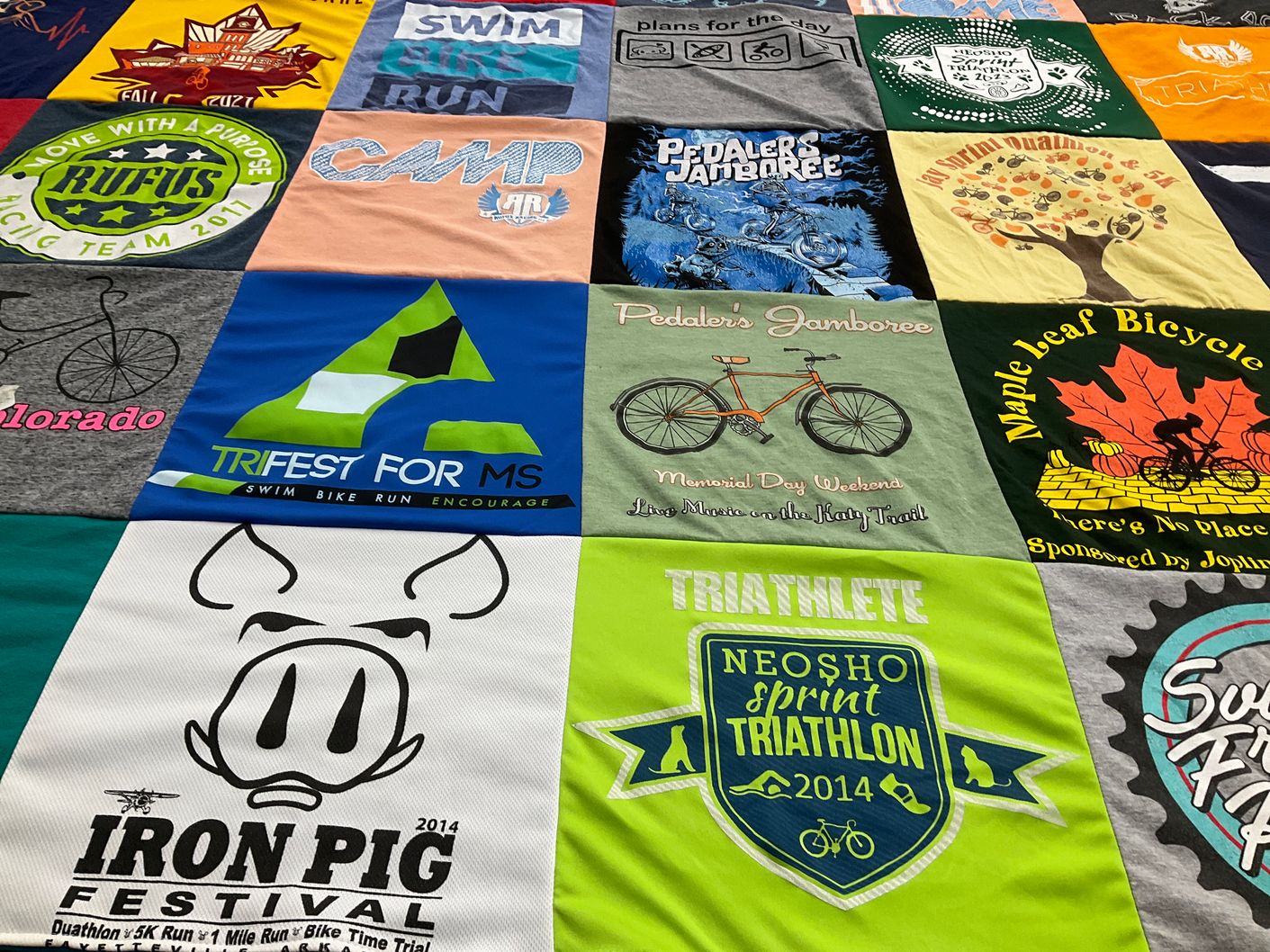 T-shirt quilt with cycling, running themes by Sharon from MO