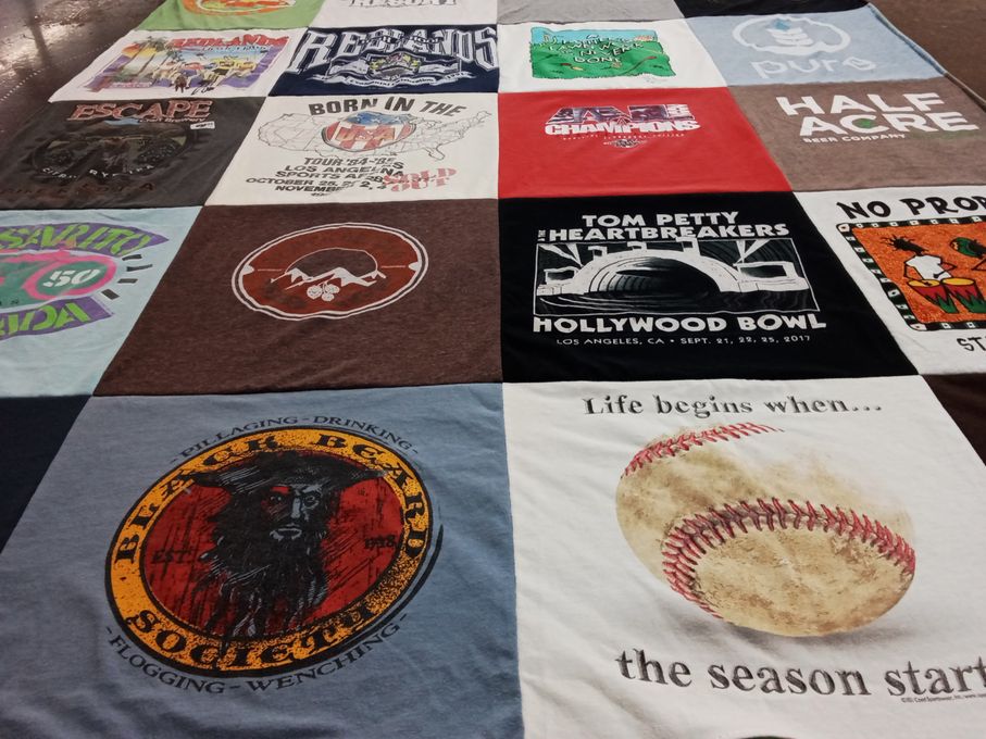 T-shirt quilt with music, baseball themes by Nancy from CA