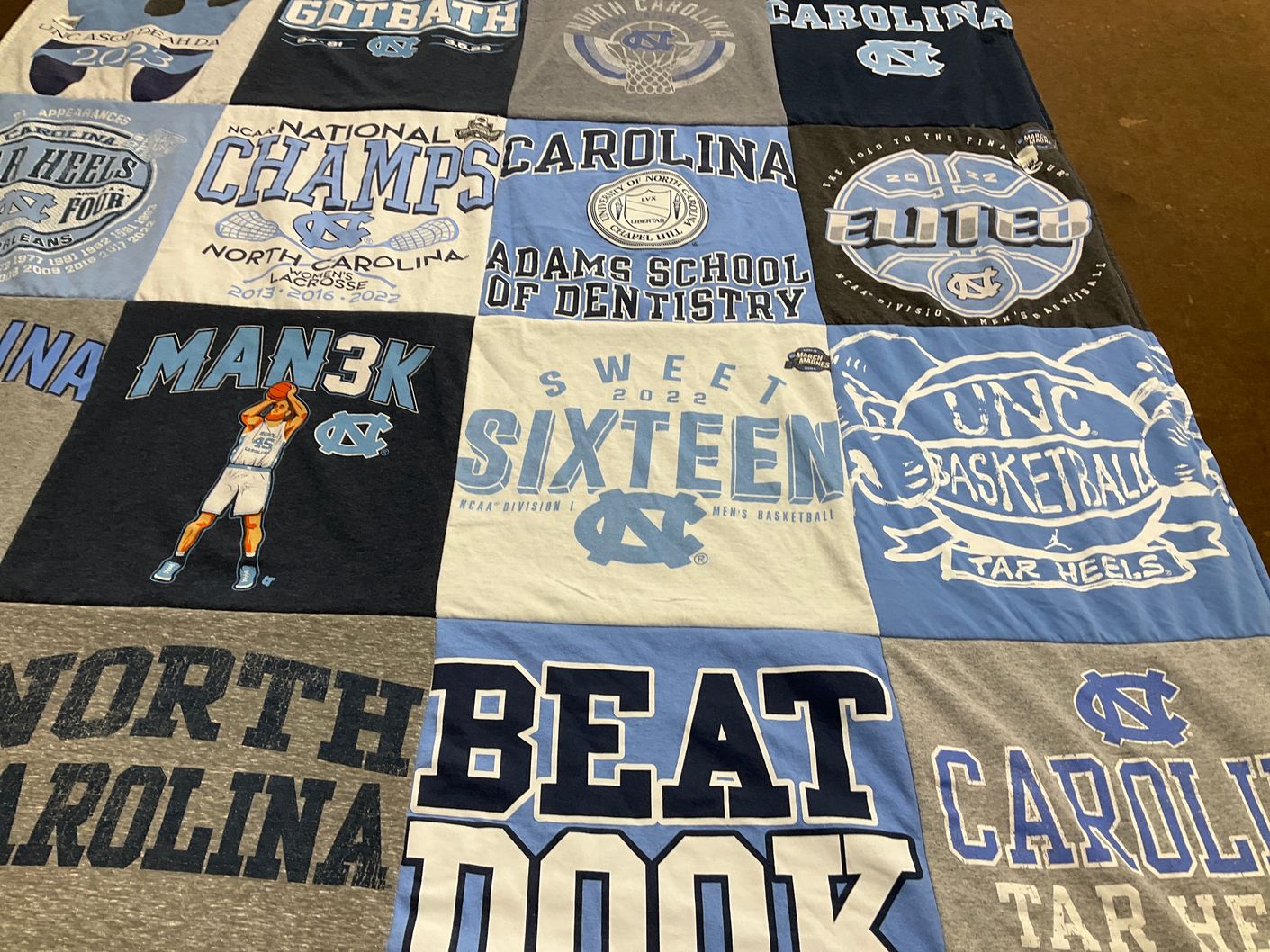 T-shirt quilt featuring university of north carolina tar heels by David from NC