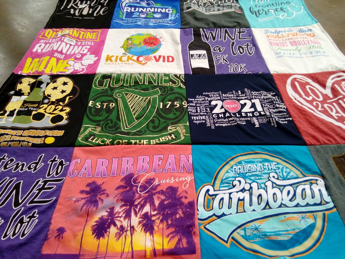 T-shirt quilt with running, wine themes by Sheila from CA