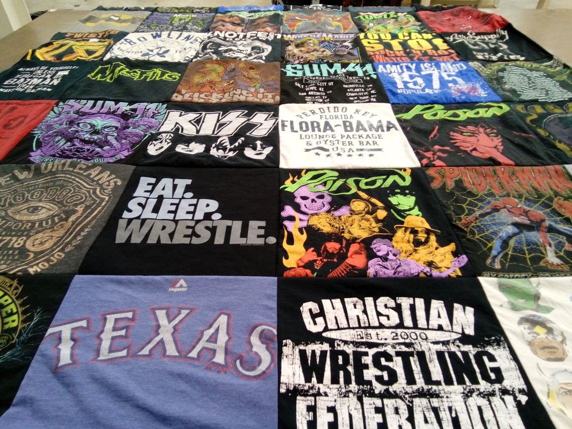 T-shirt quilt with wrestling, rock music themes by Leslie from TX