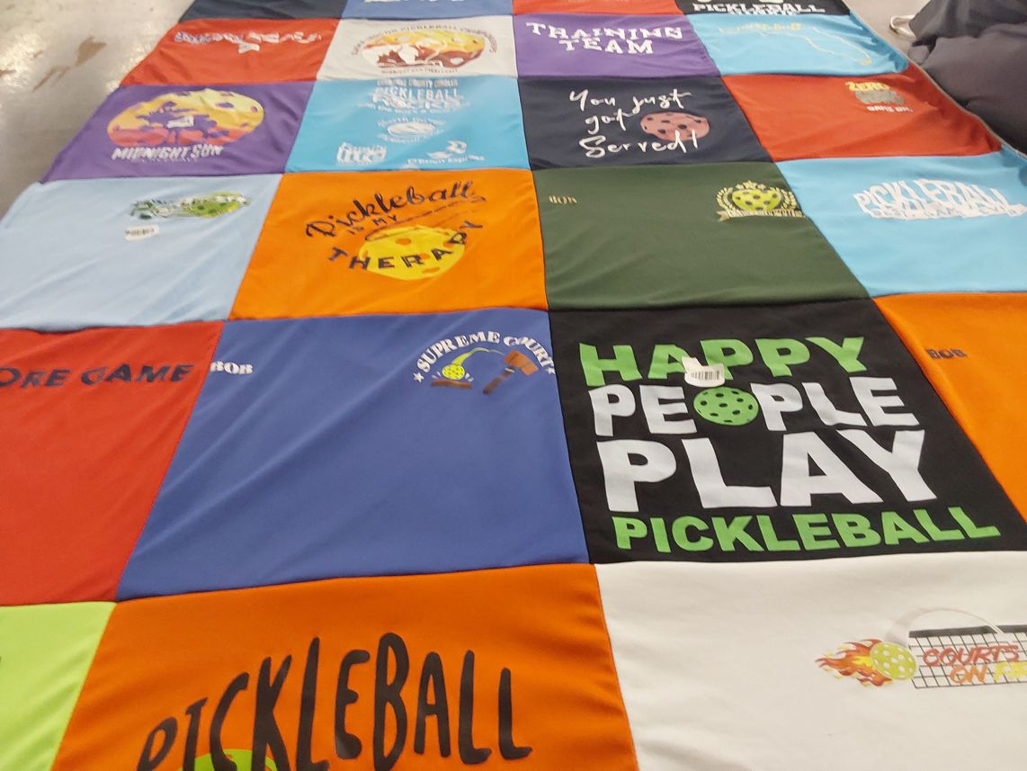 T-shirt quilt with pickleball themes by S. Susan from FL