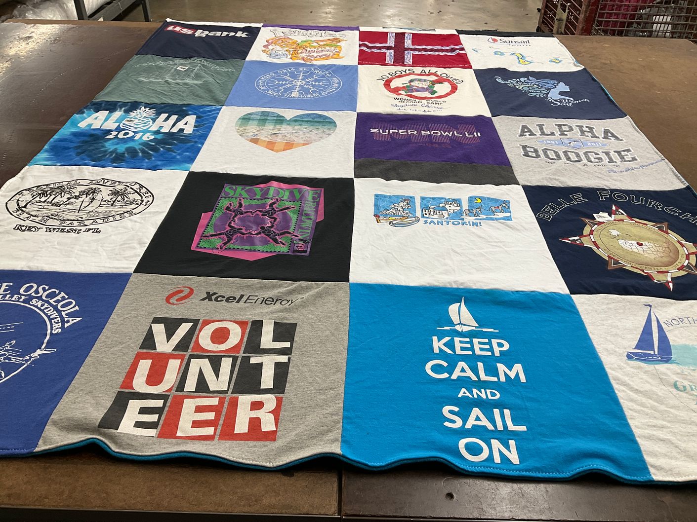 T-shirt quilt with travel, outdoors themes by Lisa from MN