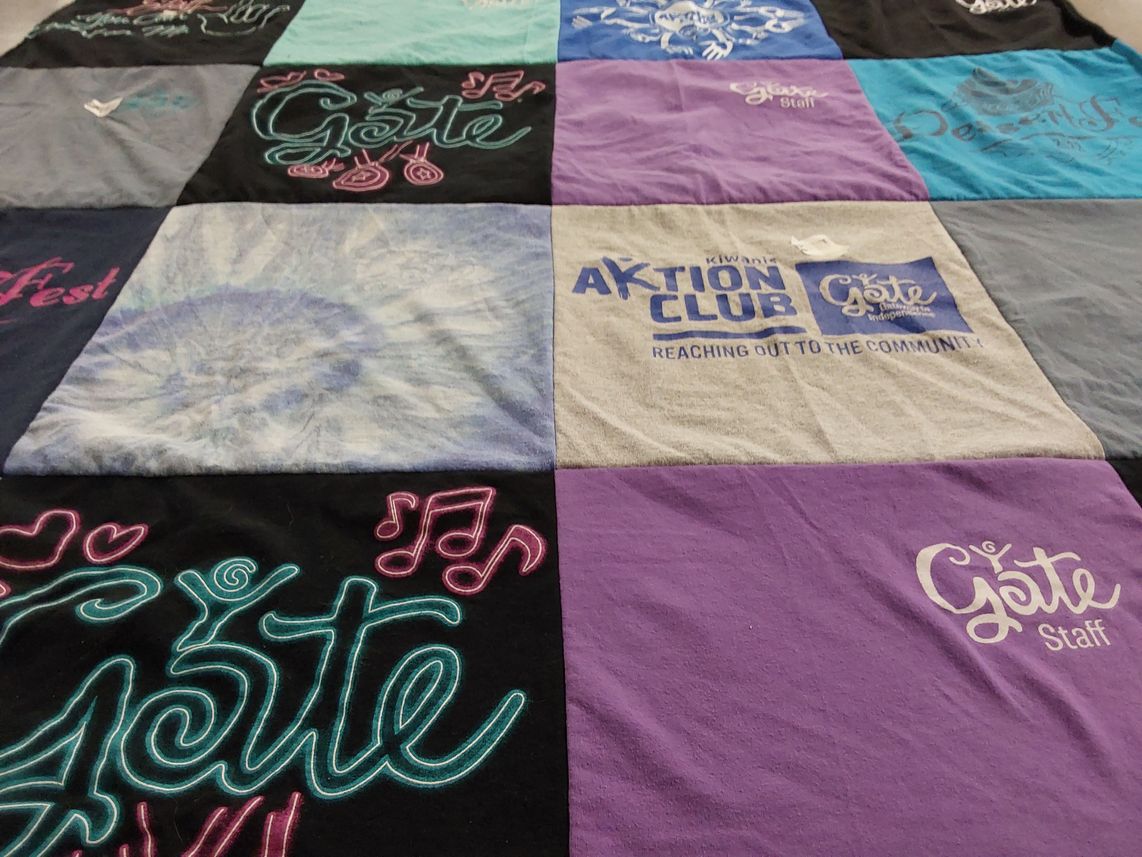 T-shirt quilt with community service, volunteering themes by Lillian from TN