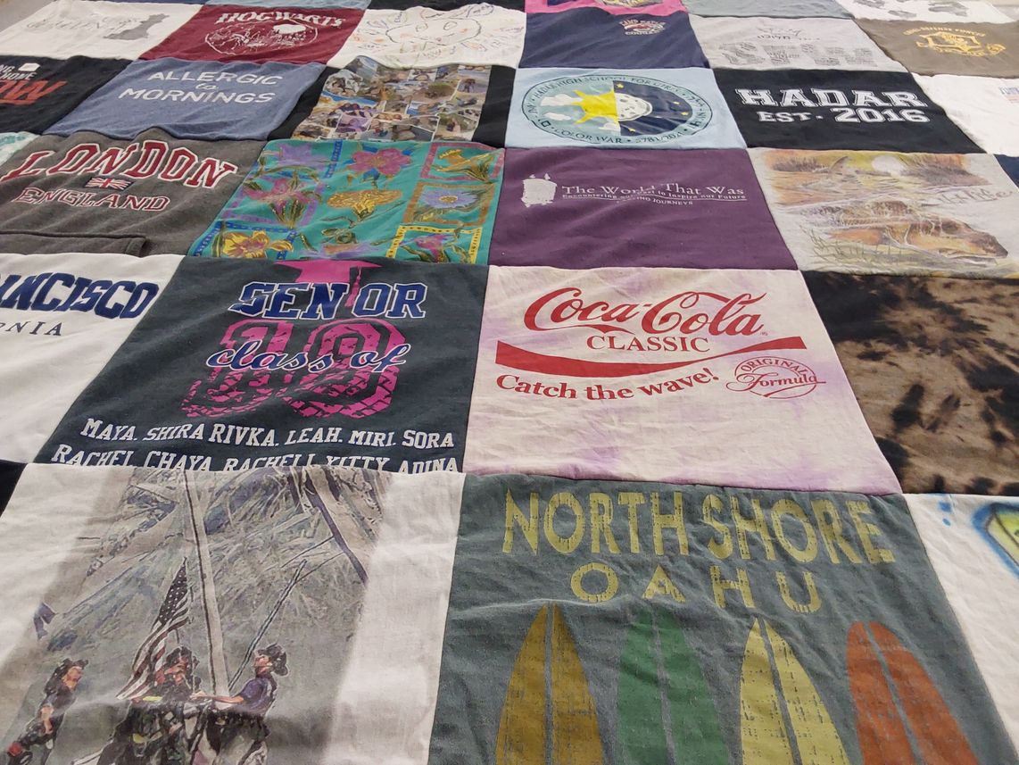 T-shirt quilt with travel, beach themes by June from FL