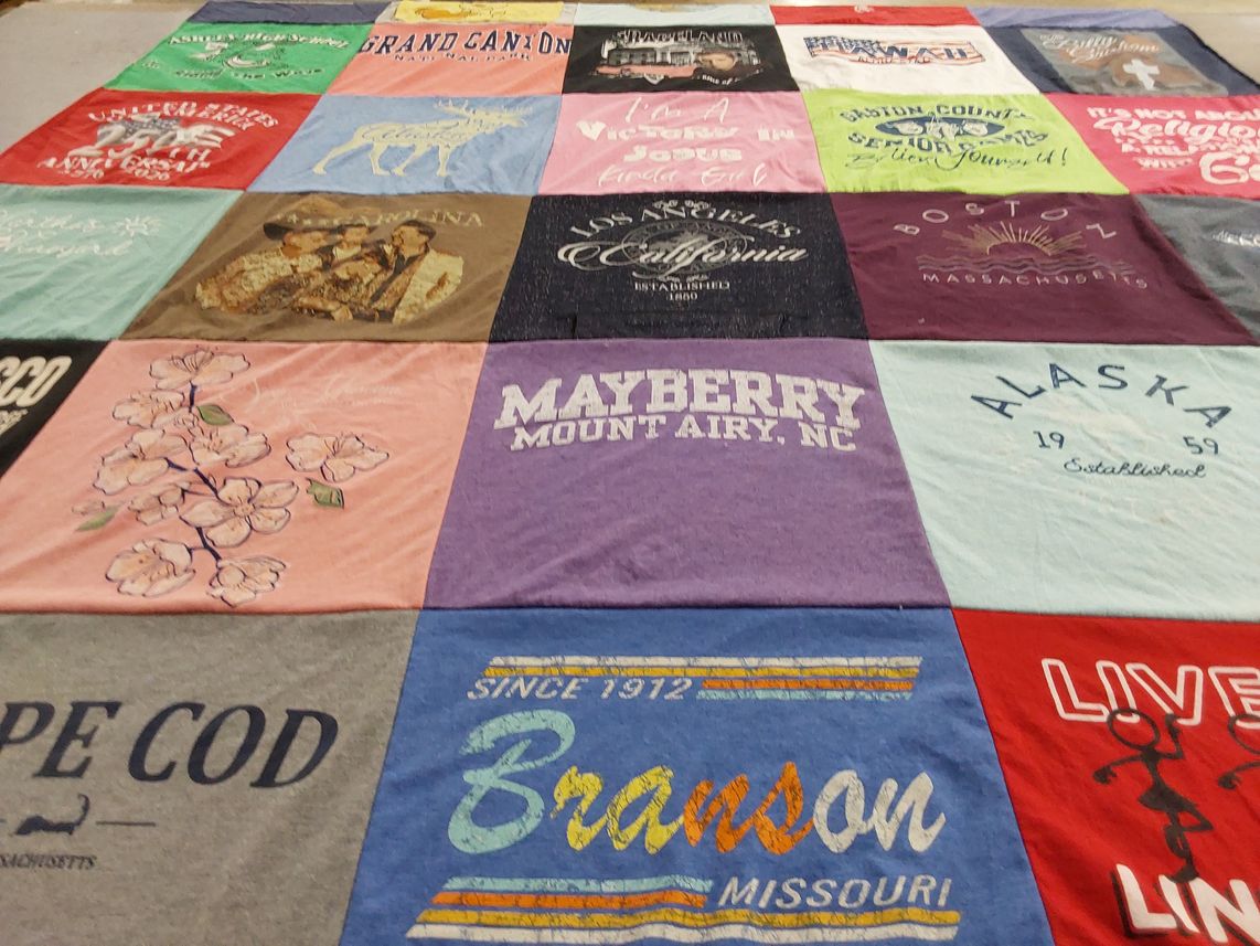 T-shirt quilt with travel, nature themes by Juanita C from NC