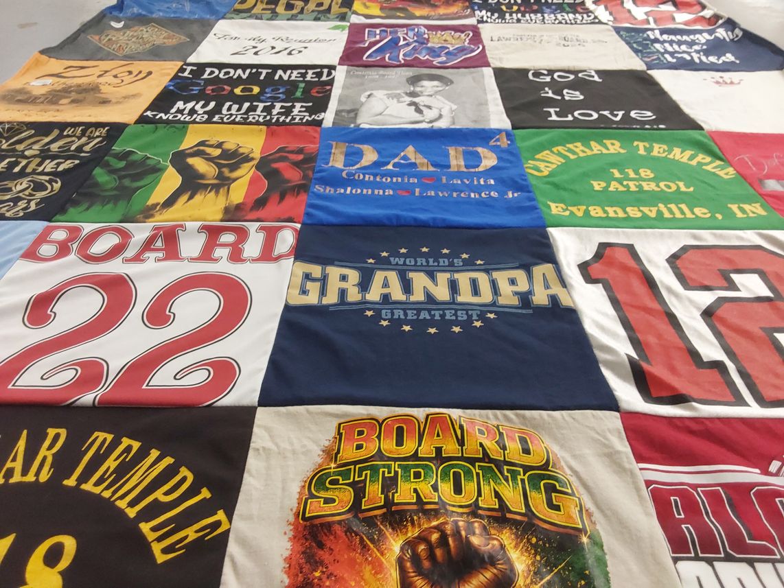 T-shirt quilt with family, community themes by Linda from KY