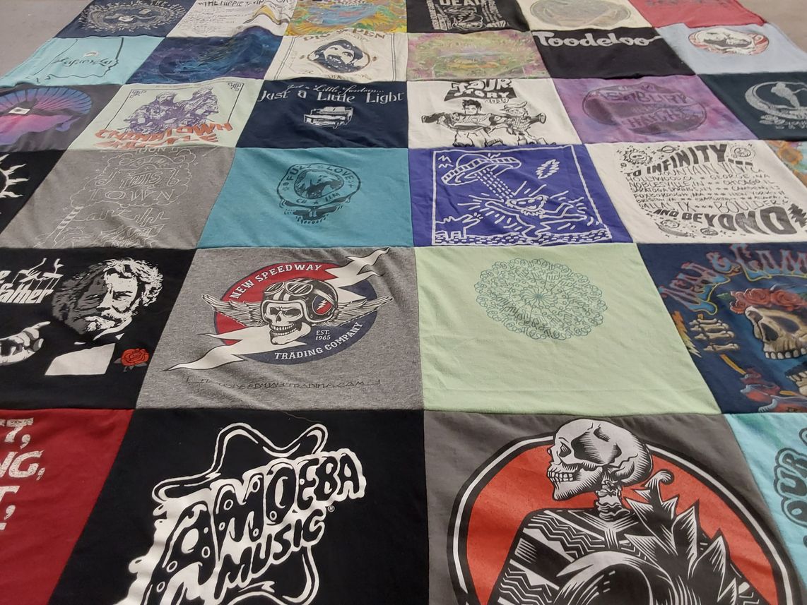 T-shirt quilt with music, art themes by Cara from SC