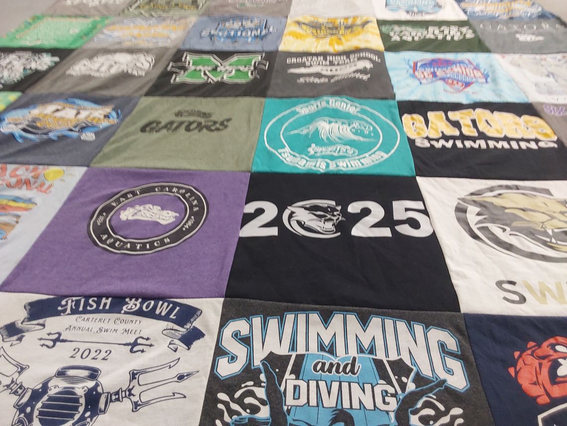 T-shirt quilt featuring gators swimming by Megan from NC