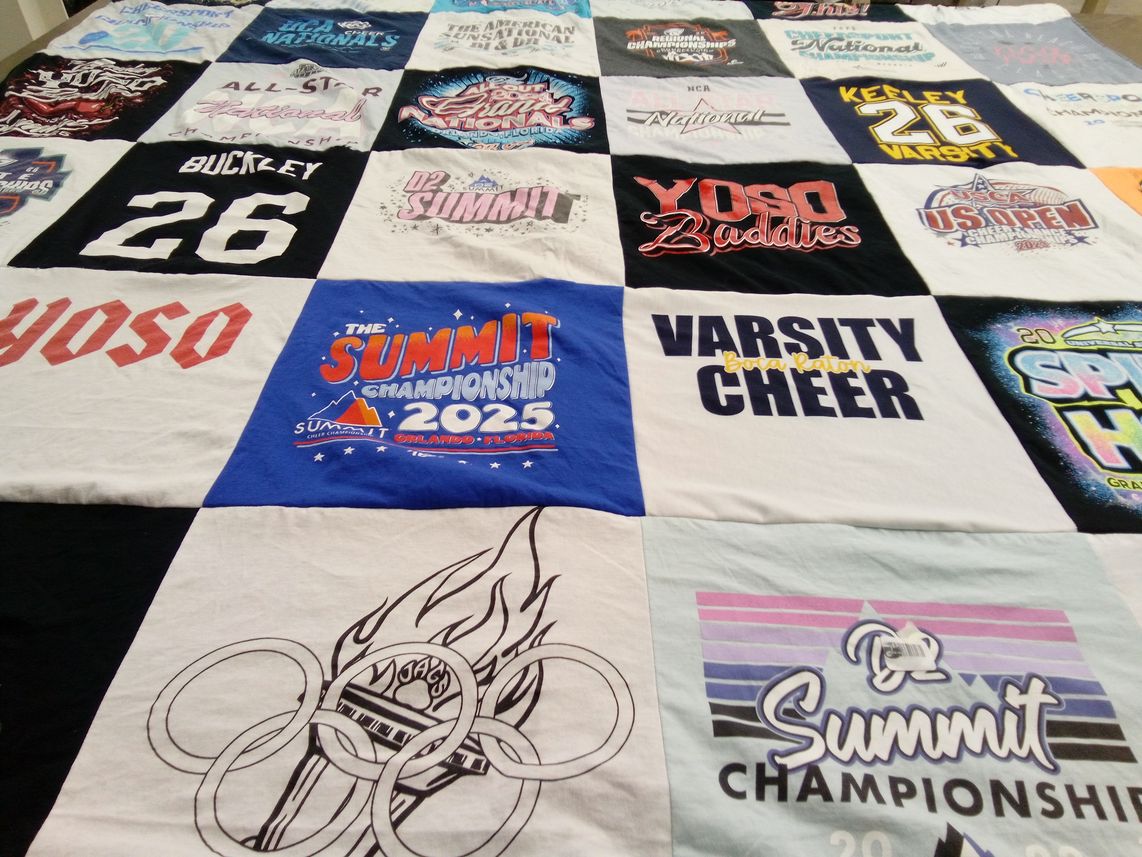 T-shirt quilt with cheerleading themes by Susan from FL