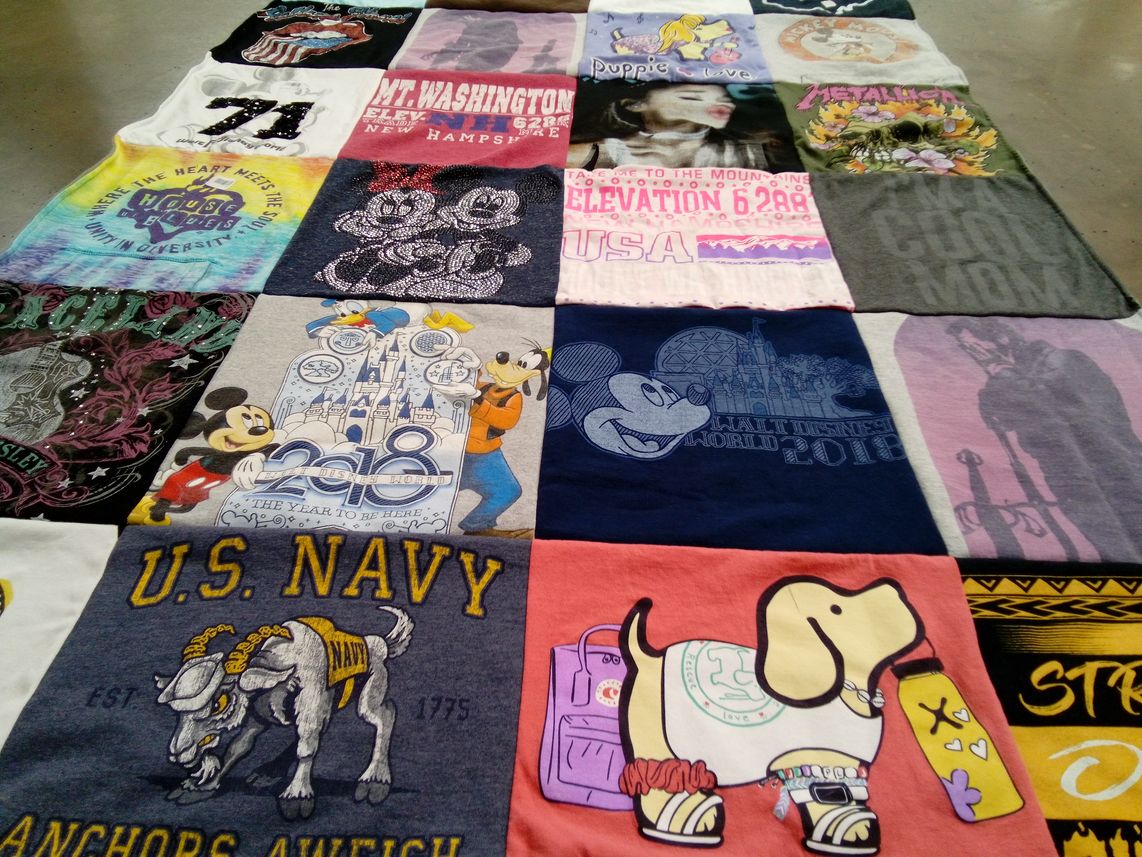 T-shirt quilt with disney, music themes by Angela from NY