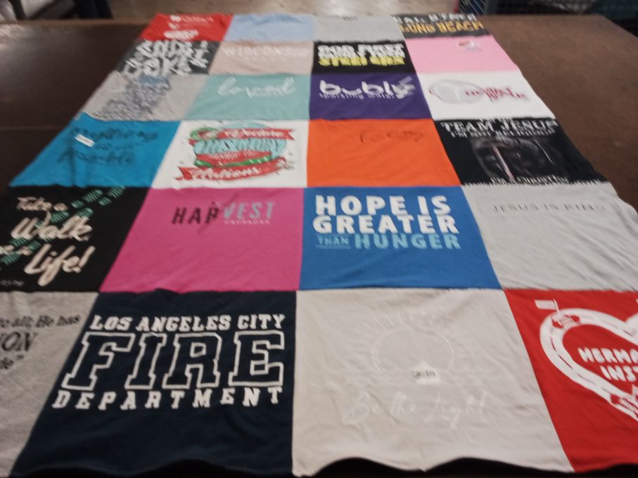 T-shirt quilt with community service, faith themes by Julia from WI