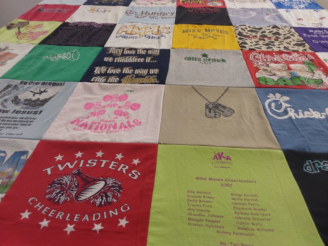 T-shirt quilt with cheerleading themes by Michele from TX