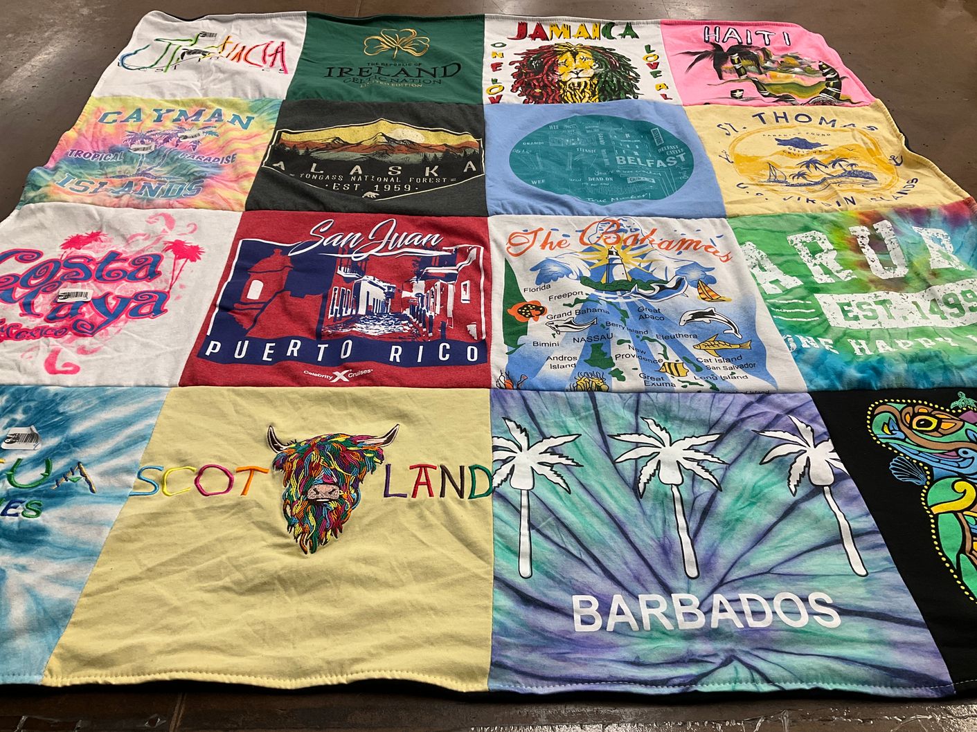 T-shirt quilt with travel themes by Wanda from MA