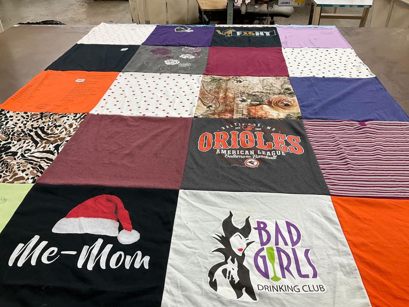 T-shirt quilt with sports, drinking themes by Debra from MD