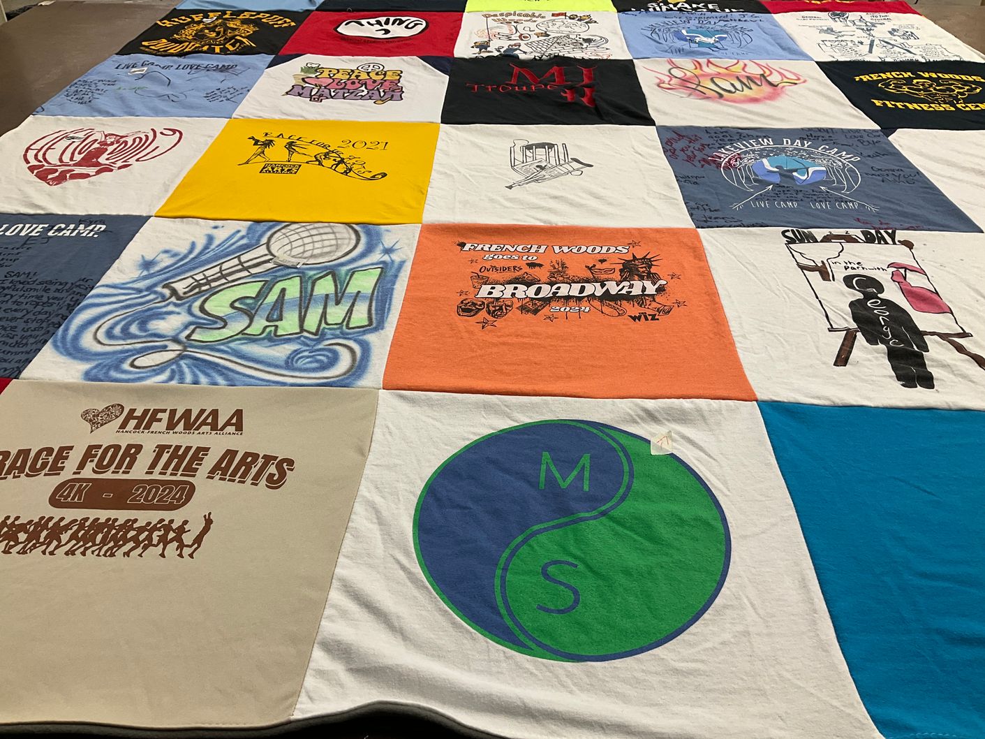 T-shirt quilt with arts, camping themes by Karen from NJ