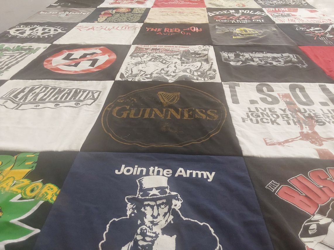 T-shirt quilt with music, activism themes by Marc from CA