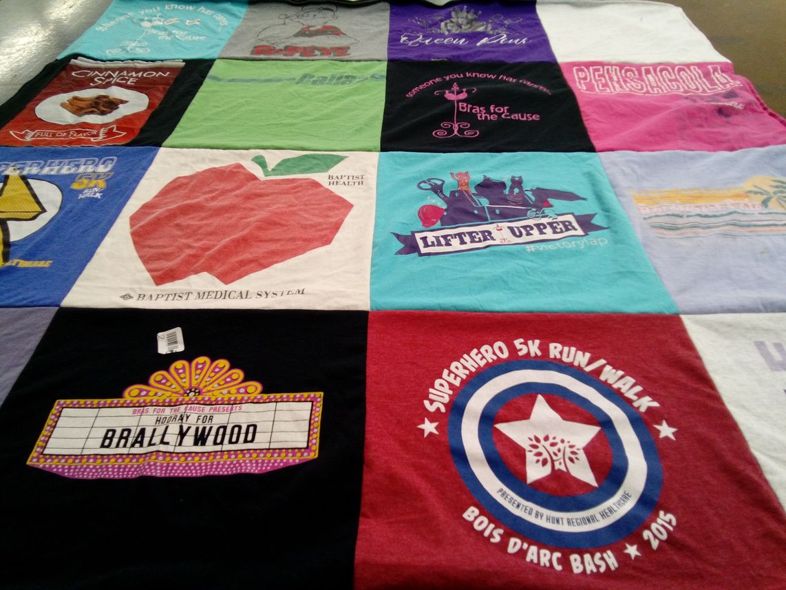 T-shirt quilt with health, fitness themes by Cori from TX