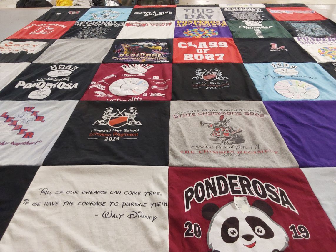 T-shirt quilt featuring loveland high school crimson regiment by Jennifer from CO