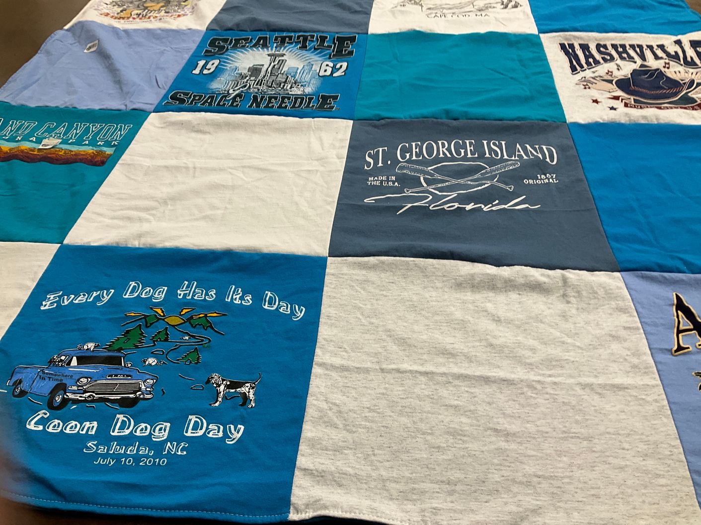 T-shirt quilt with travel, outdoors themes by Mary from AL