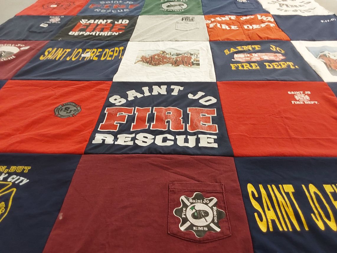 T-shirt quilt with firefighting, emergency services themes by Dana from TX