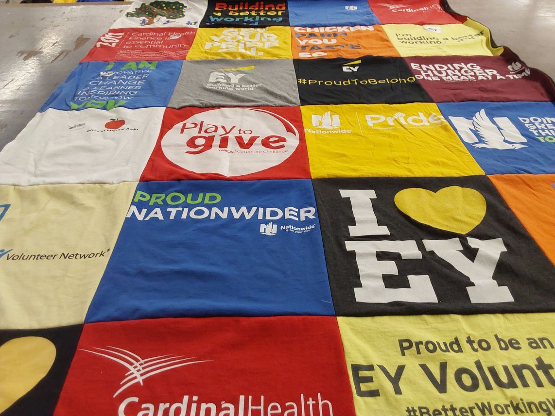 T-shirt quilt with volunteering, community service themes by Cathy from OH