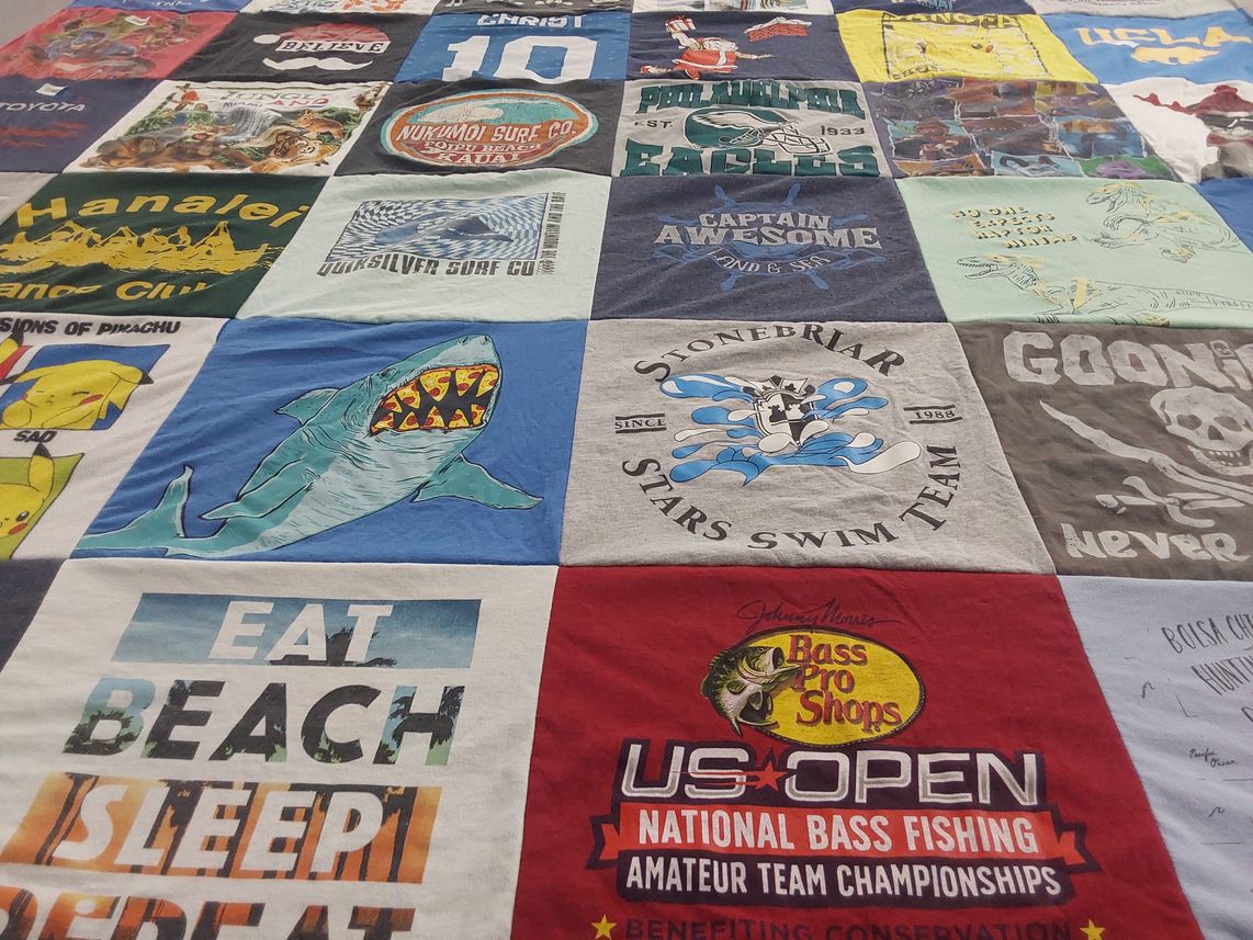 T-shirt quilt featuring stonebriar stars swim team by David from TX