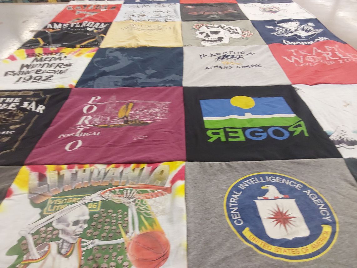 T-shirt quilt with travel, sports themes by Gerry from CA
