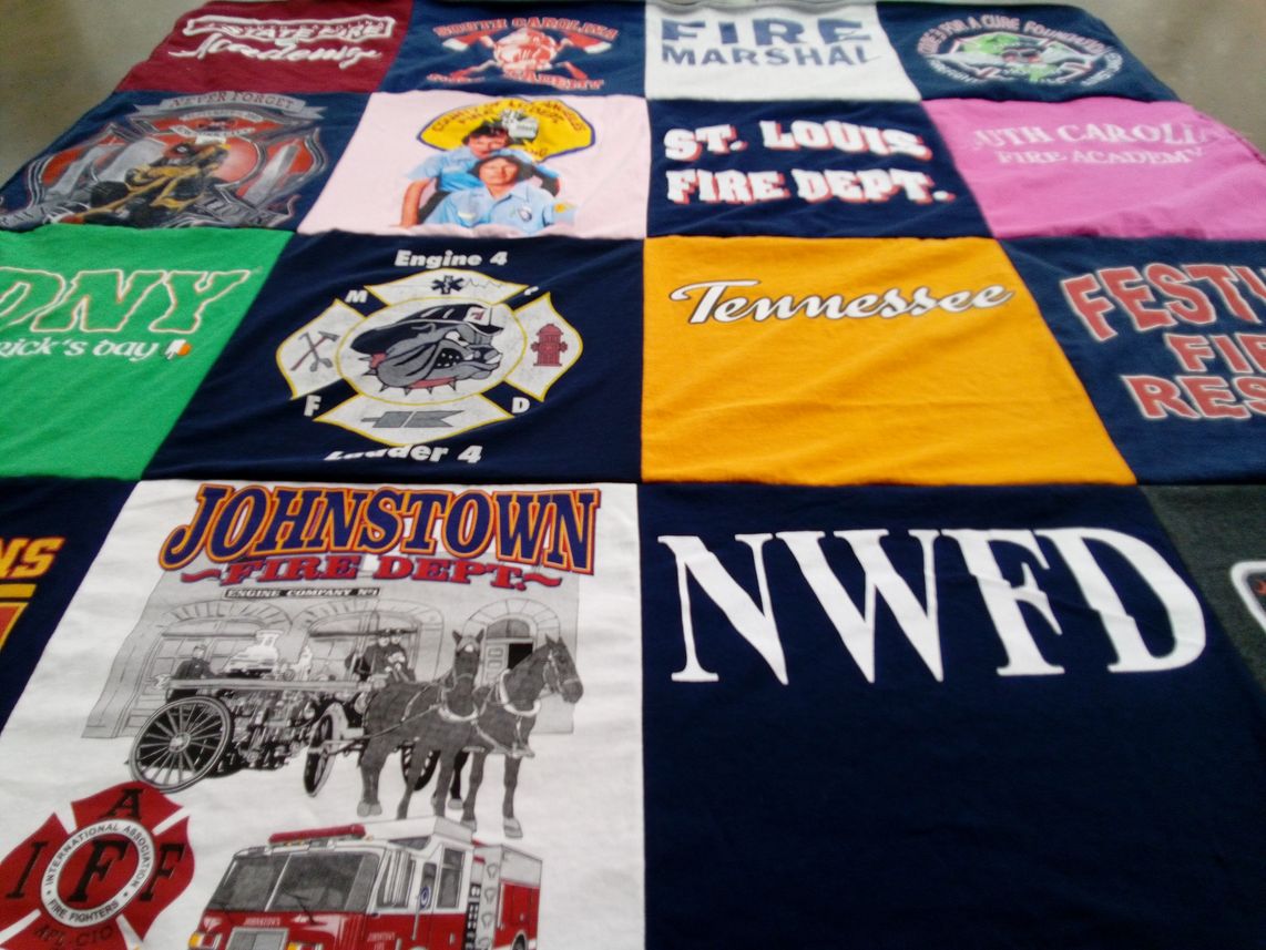 T-shirt quilt with firefighting, emergency services themes by Andrea from IL