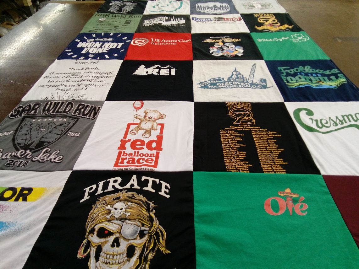 T-shirt quilt with running, events themes by Angela from CA